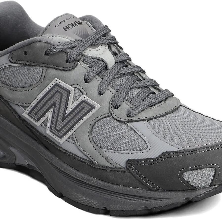 New Balance x Comme Des Garçons Homme sneakers met logopatch en vlakken Grijs