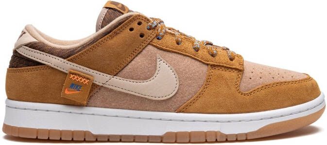 Nike Dunk Low SE sneakers met teddybeer Bruin