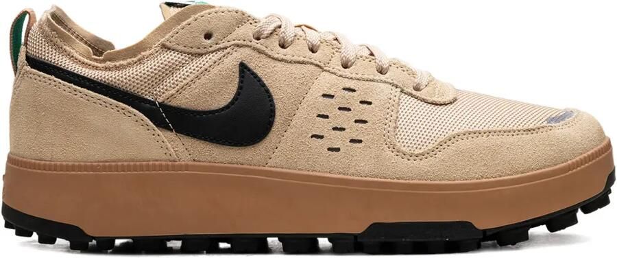 Nike Vomero 18 low-top sneakers met veters Roze