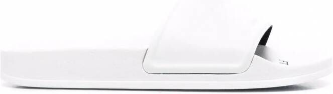 Off-White Slippers met logo-reliëf Wit