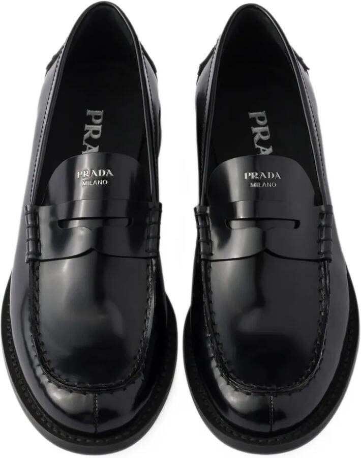 Prada Geborstelde leren sneakers Zwart