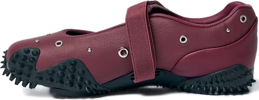 PUMA Mostro Fey sneakers met studs Rood