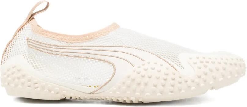 PUMA Mostro Flex sneakers met ronde neus Beige