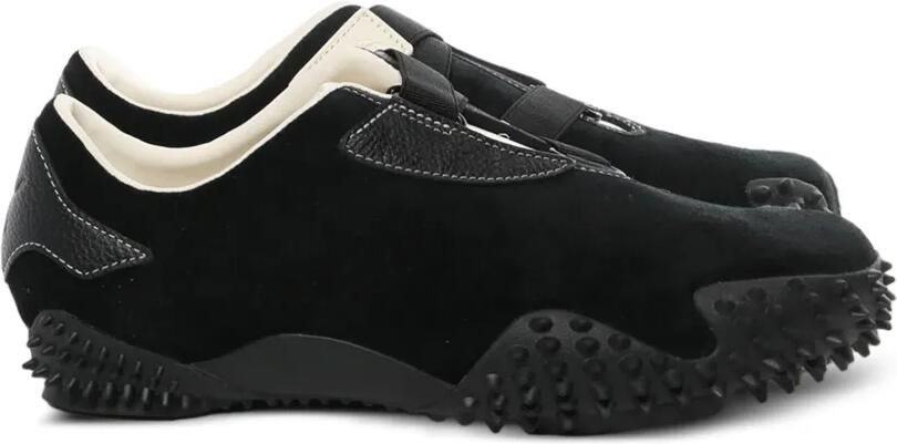 PUMA Mostro Icons sneakers met studs Zwart