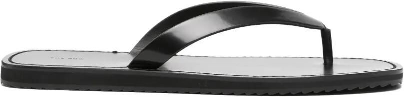 The Row Carey leren teenslippers Zwart