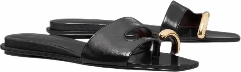 Tory Burch Pierced leather slides Zwart