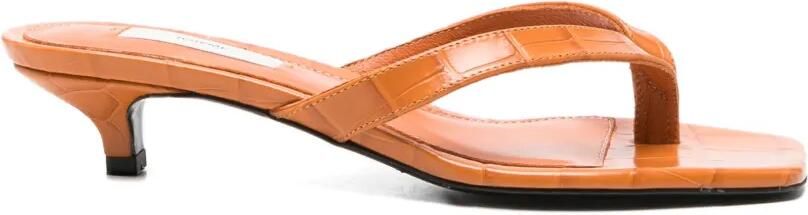 TOTEME Teenslippers met krokodillen-reliëf en hak Oranje