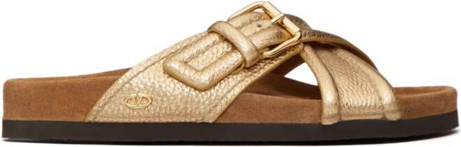 Valentino Garavani Slippers met gekruiste bandjes Goud