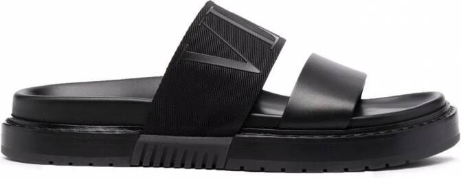 Valentino Garavani Slippers met logo reliëf Zwart