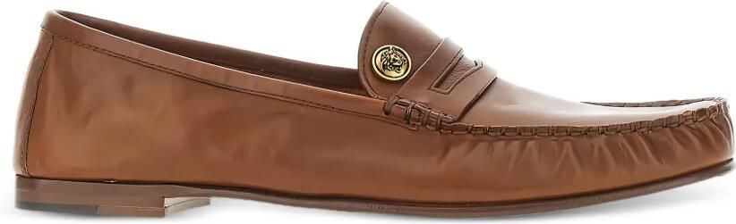 Versace Guanto leren loafers met verfraaid logo Bruin