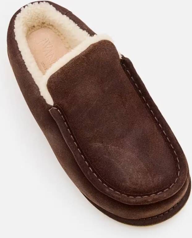 J.W.Anderson Slippers & Mules Brown Suede Mules With Cozy Fur Interior And Embos in bruin