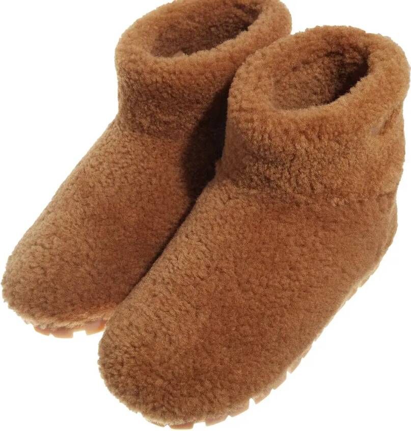 Prada Enkellaarzen Boots with Shearling in bruin