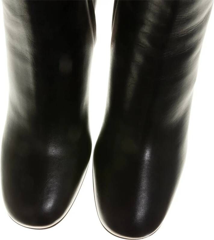 Prada Enkellaarzen Triangle Logo Boots in zwart
