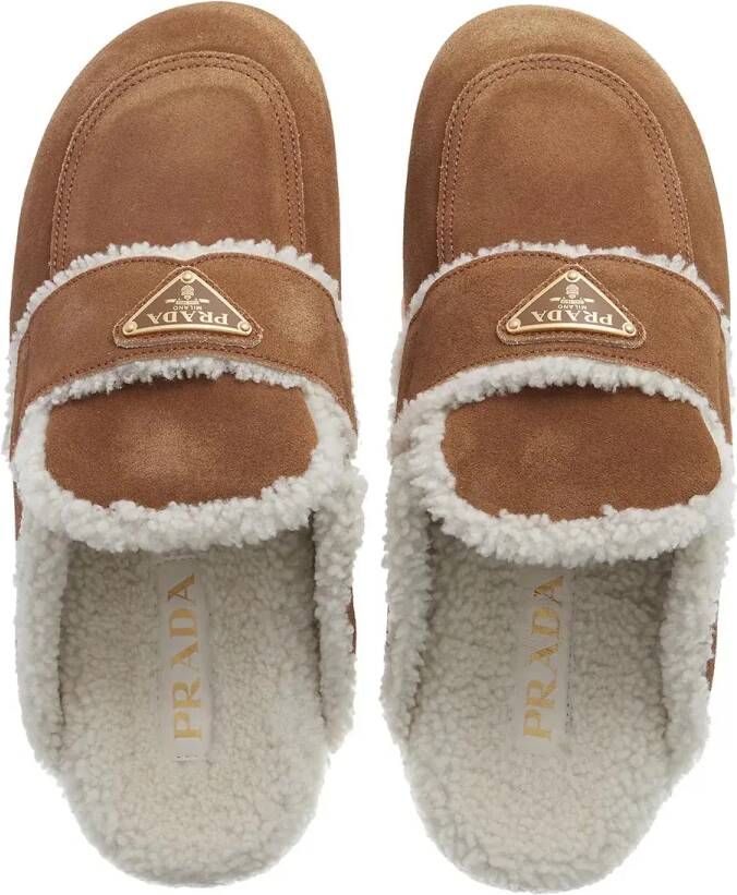 Prada Slippers & Mules Shearling Trim Suede Mules in bruin
