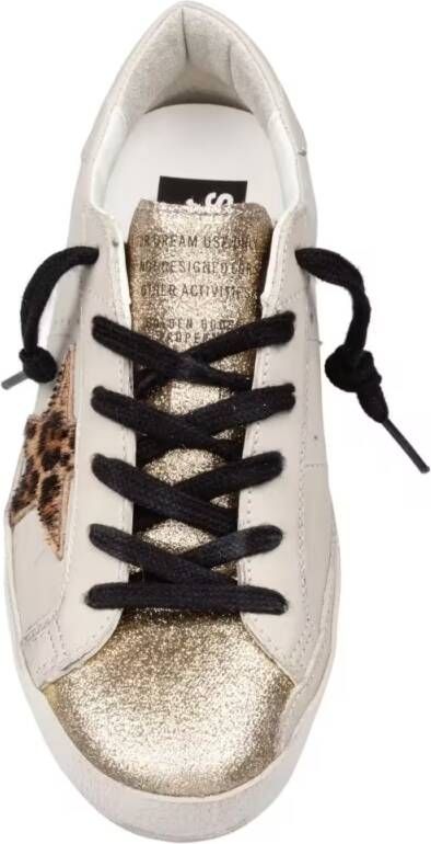 Golden Goose Low-Top Sneakers Gold Glitter Sneakers With Pony Hair Star Accent in goud