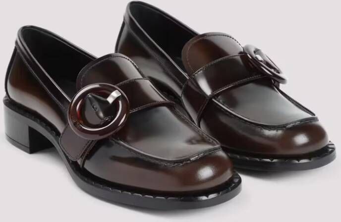Prada Calf Leather Loafers With Circular Buckle Detail in zwart
