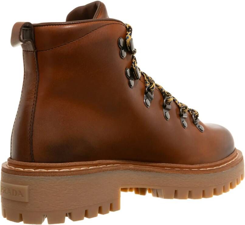 Prada Enkellaarzen Laced Logo Ankle Boots in cognac