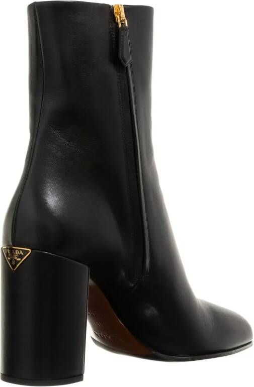 Prada Enkellaarzen Triangle Logo Boots in zwart