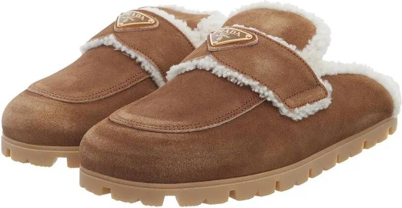 Prada Slippers & Mules Shearling Trim Suede Mules in bruin
