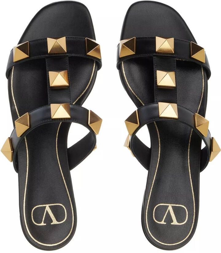 Valentino Garavani Slippers Roman Stud Slide Sandals in zwart