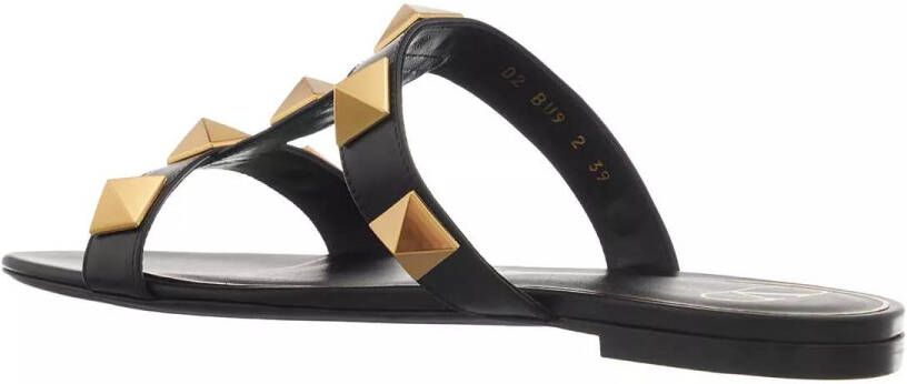 Valentino Garavani Slippers Roman Stud Slide Sandals in zwart