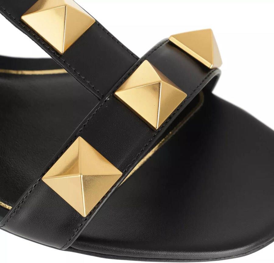 Valentino Garavani Slippers Roman Stud Slide Sandals in zwart