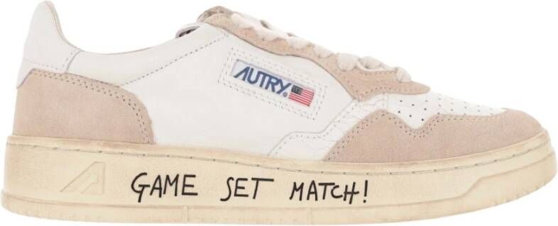 Autry Witte leren sneakers met geperforeerde neus en gewatteerde enkel Wit Dames