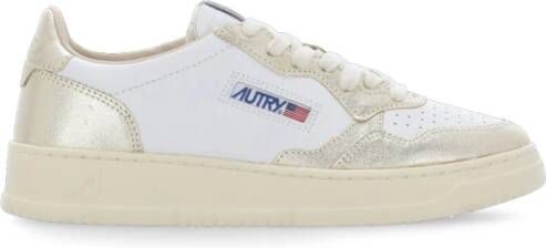 Autry Gouden Leren Sneakers met Metalen Effecten