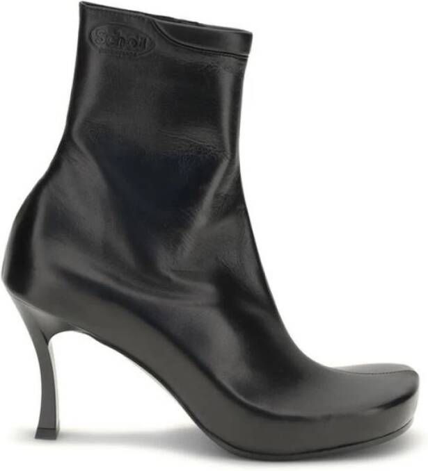 Balenciaga Enkellaarzen van schapenvacht met reliëflogo's