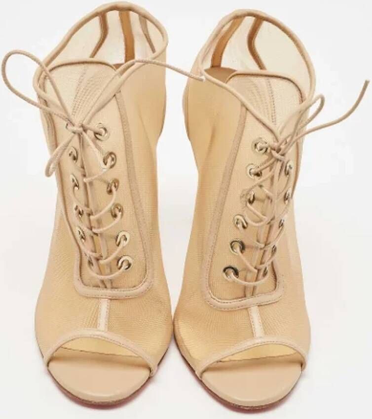 Christian Louboutin Pre-owned Canvas boots Beige Dames