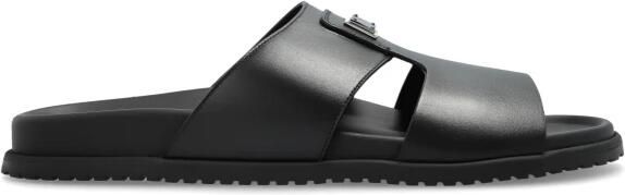 Dolce & Gabbana Leren slippers met applicatie