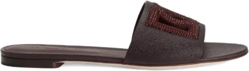 Dolce & Gabbana Platte slippers van suède en dauphine kalfsleer