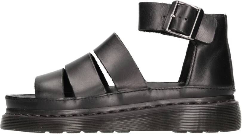 Dr. Martens Zwarte platte leren sandalen met verstelbare gespsluiting Black Dames
