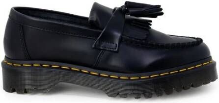 Dr. Martens Zwarte leren platte schoenen met kwastdetail Black