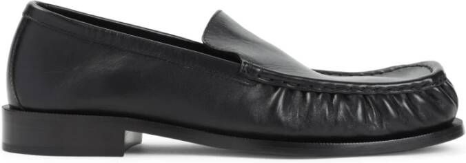 Dries Van Noten Zwarte leren loafers met reliëfstiksels