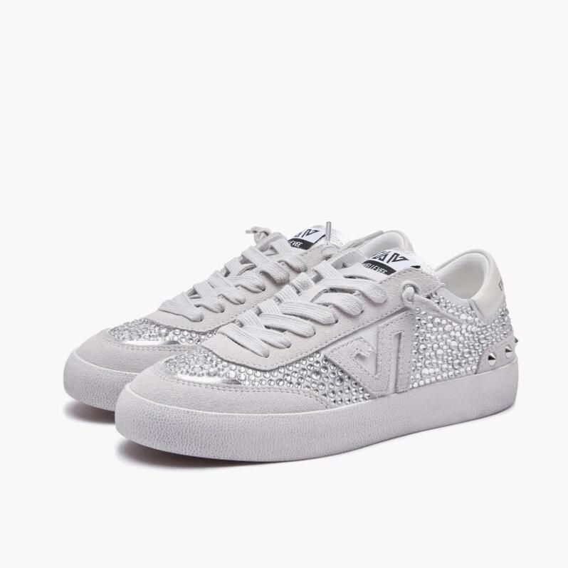 E uelle Vee Witte sneakers met strass-details