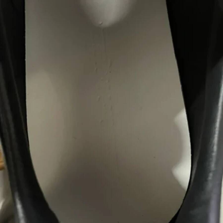 Alexander McQueen Pre-owned Leather sneakers Black Dames