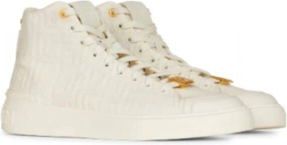 Balmain Witte hoge sneakers met monogrampatroon en gouden logo Beige Dames