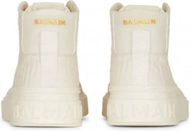 Balmain Witte hoge sneakers met monogrampatroon en gouden logo Beige Dames