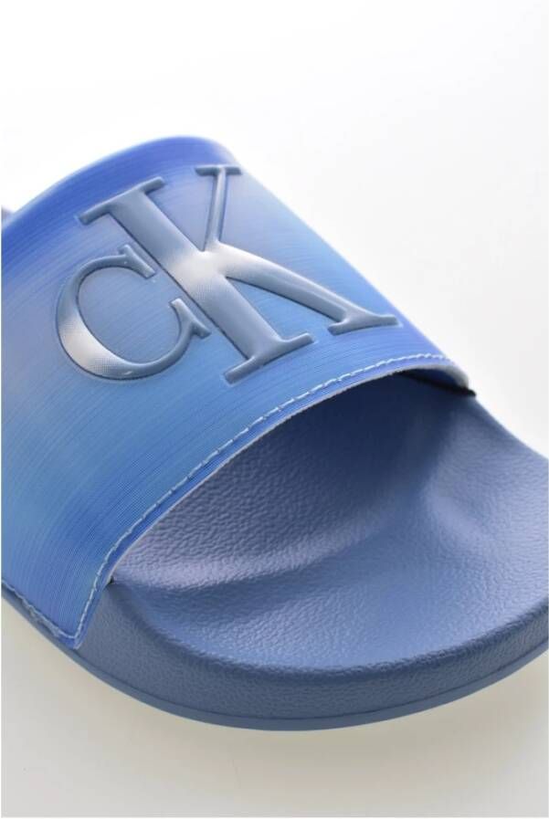 Calvin Klein Platte PVC-muiltjes met logo reliëf Blue Heren