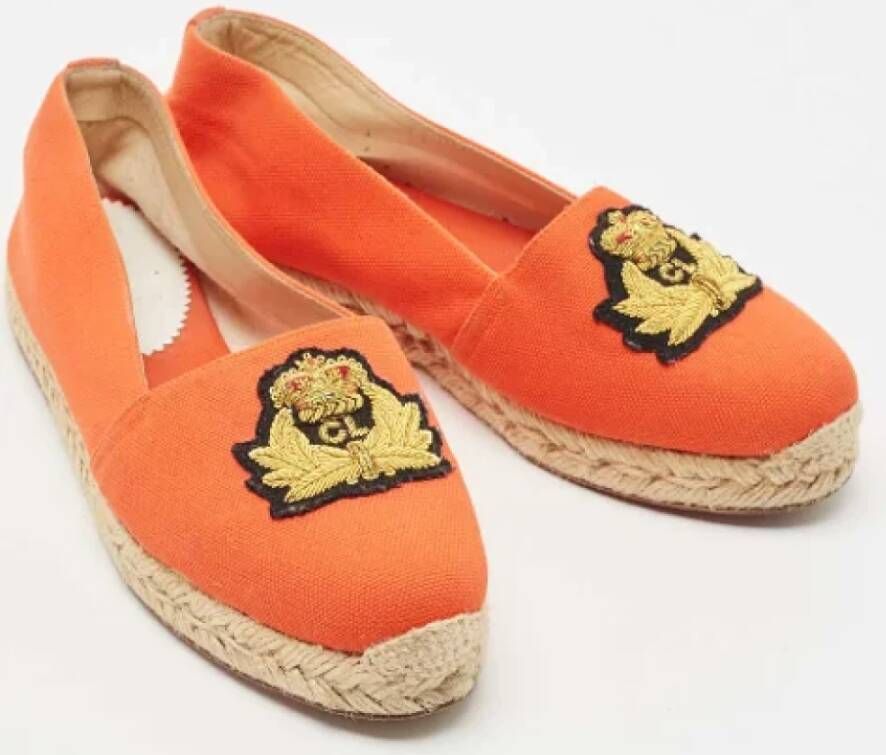 Christian Louboutin Pre-owned Canvas flats Orange Dames