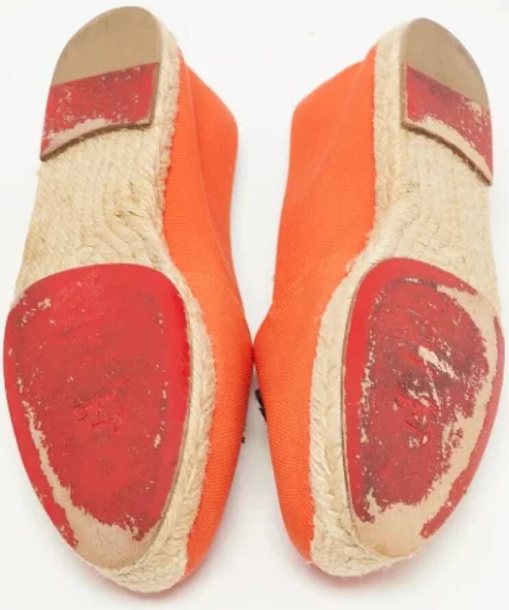 Christian Louboutin Pre-owned Canvas flats Orange Dames