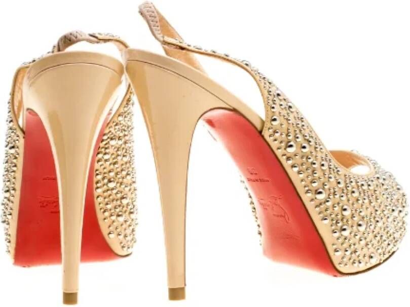 Christian Louboutin Pre-owned Leather sandals Beige Dames