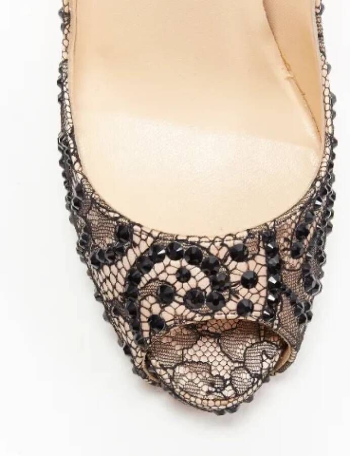 Christian Louboutin Pre-owned Silk heels Beige Dames
