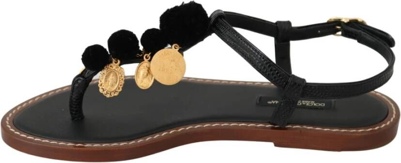 Dolce & Gabbana Lederen munten slippers Zwart Dames