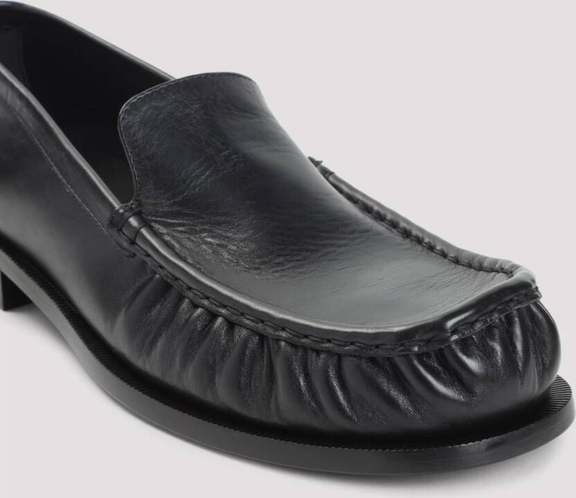 Dries Van Noten Zwarte leren loafers met reliëfstiksels