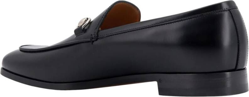 Gucci Platte zwarte schoenen met metalen gesp