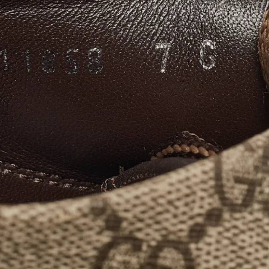 Gucci Vintage Pre-owned Coated canvas sneakers Beige Heren