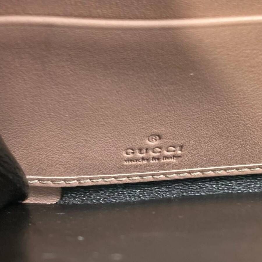 Gucci Vintage Tweedehands ZipAround Leren Portemonnee Boog Detail