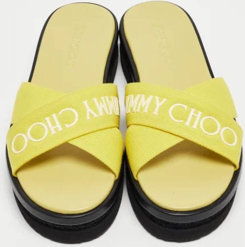 Jimmy Choo Pre-owned Canvas sandals Yellow Dames